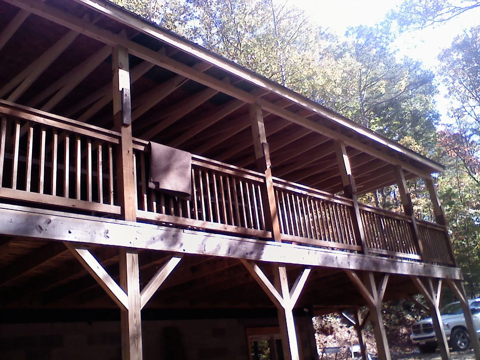 Timber framing under a new elevated porch and deck — Roof Leak Repair in Gwinner by Roofing Brothers